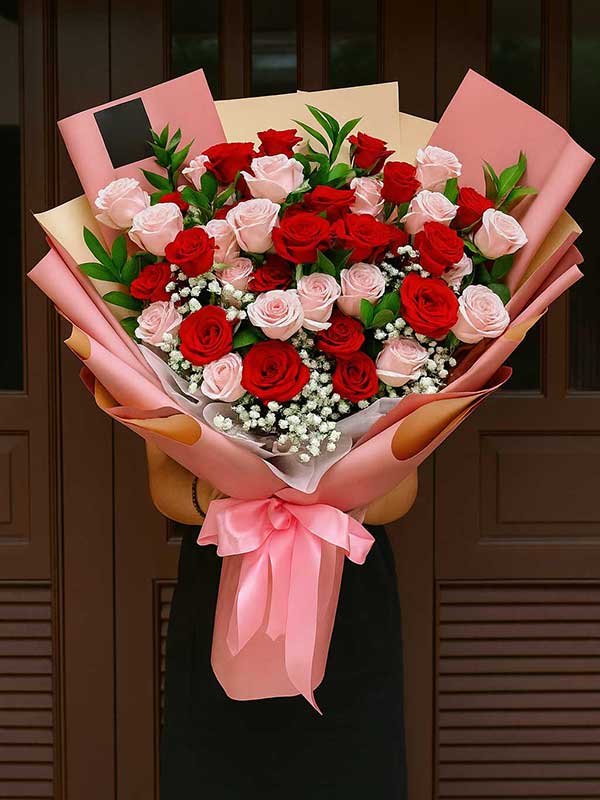 Yellow & Pink Roses with Baby Breath