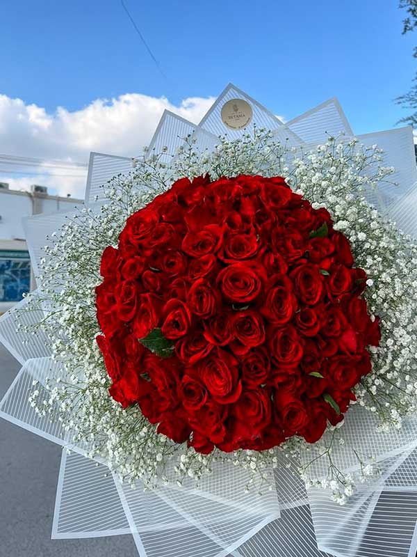 70 Red Roses & baby's Breath Bouquet
